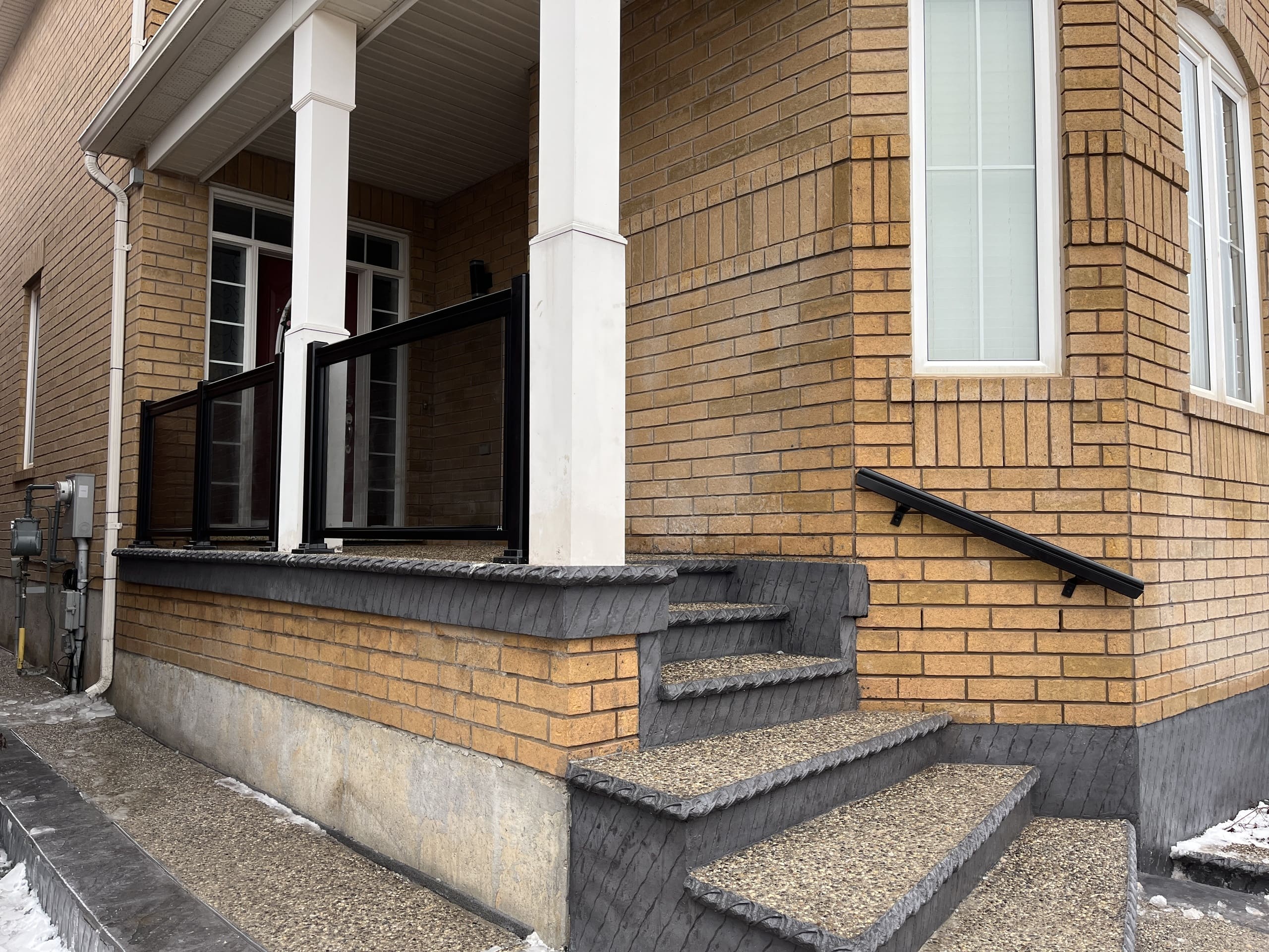 Tinted Grey Glass Railings Installation on Porch (Georgetown, ON)