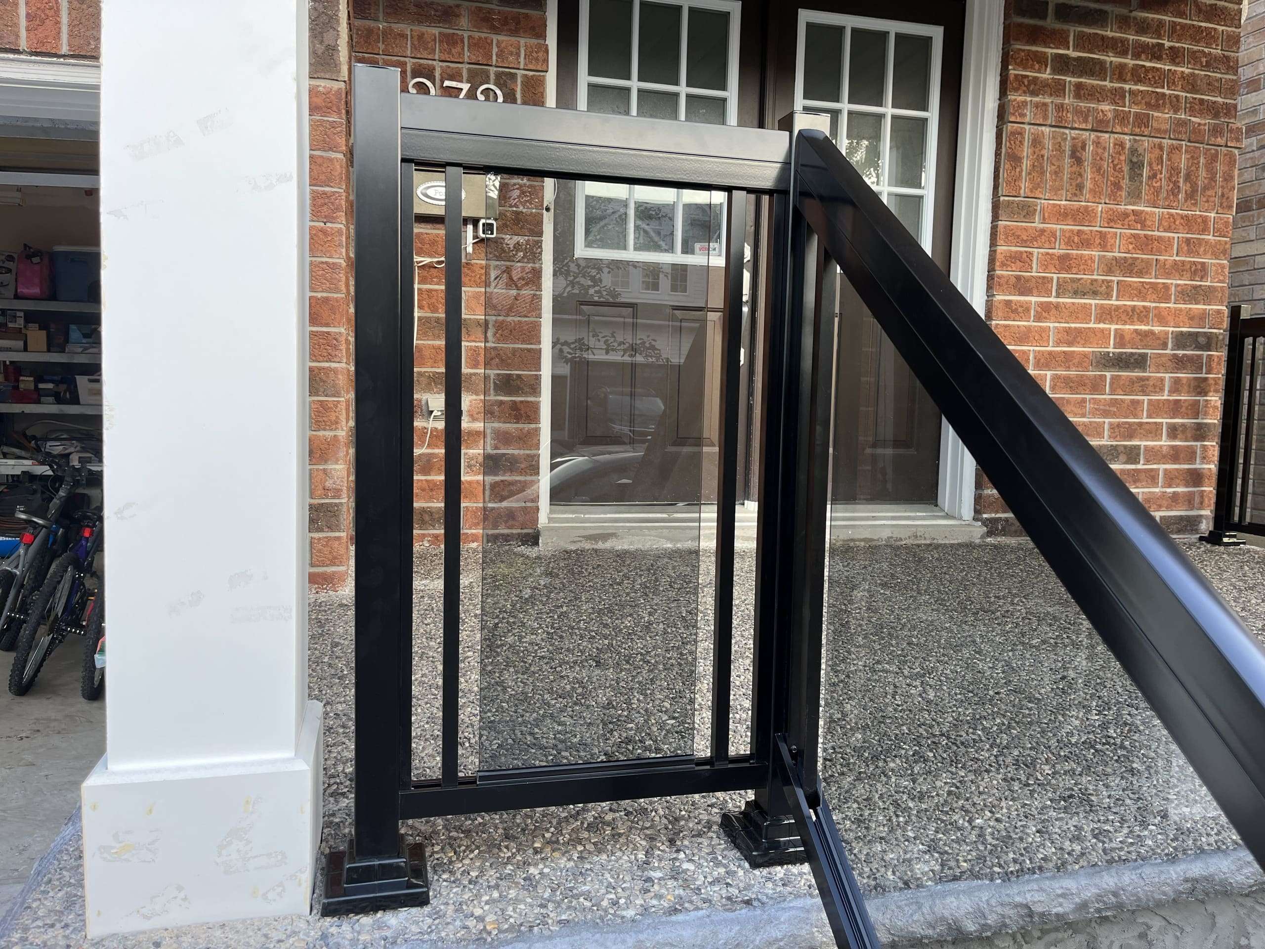 Tinted Grey Glass Porch Railings Installation on Concrete BLACK